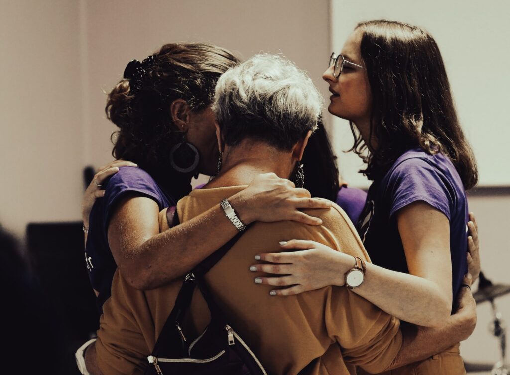 Three women praying